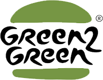 Logo avec les mots "Green Green" en texte noir stylisé, pris en sandwich entre deux ovales verts en forme de petits pains, ressemblant à un hamburger. Un petit symbole de marque déposée apparaît en haut à droite.